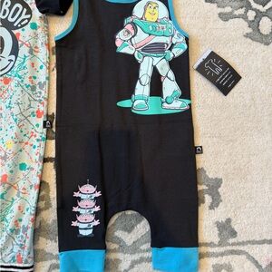 Rags to Raches Black Romper with Blue Trim